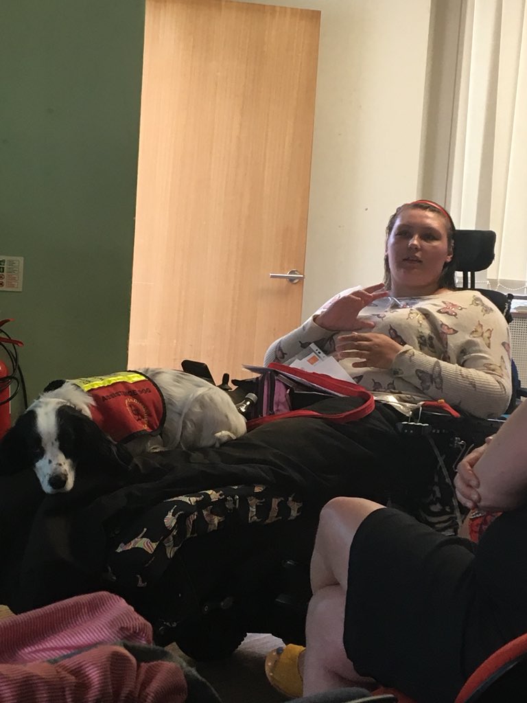 Lucy presenting to a crowd